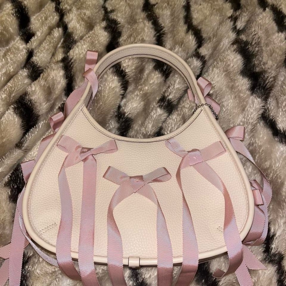 Real pink bow coachtopia ergo bag 🎀
